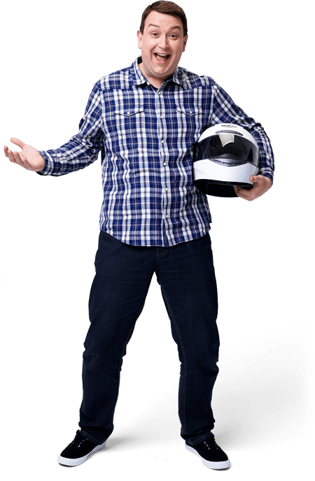 Joe holding a racing helmet